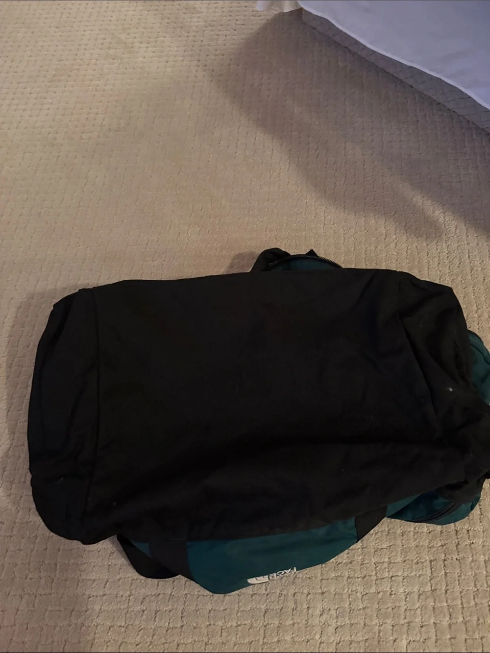 The North Face Green and Black Duffel Bag
